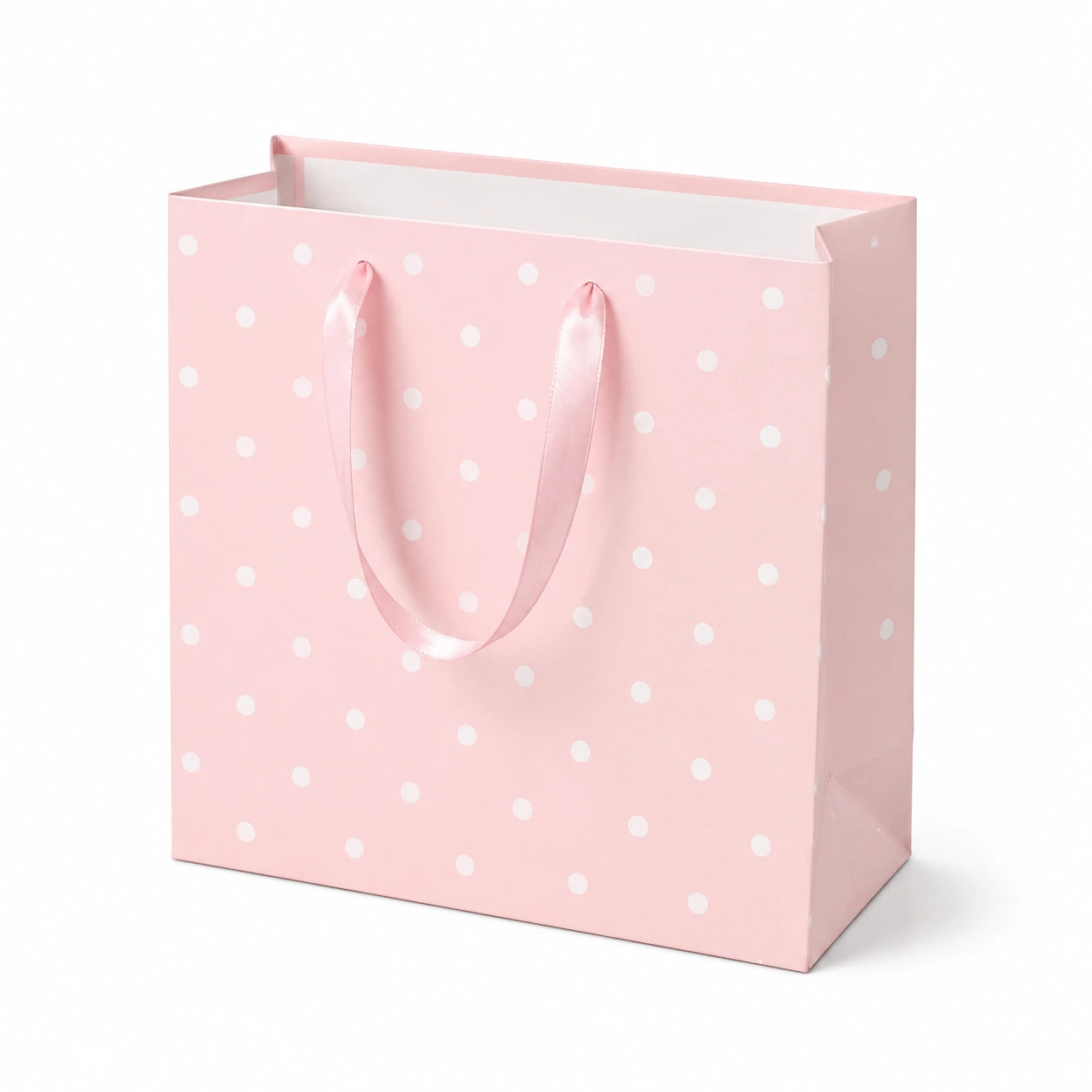 Sacchetto regalo 26 x 12 x 32 cm in carta rosa a pois con manici in nastro